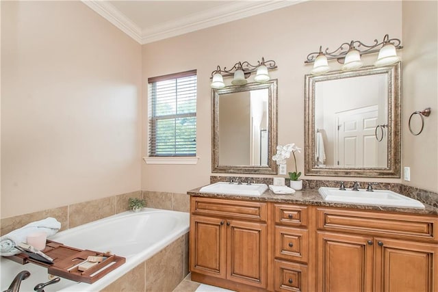 bathroom with crown molding, vanity, and tiled tub