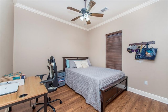 bedroom featuring crown molding, wood-type flooring, and ceiling fan