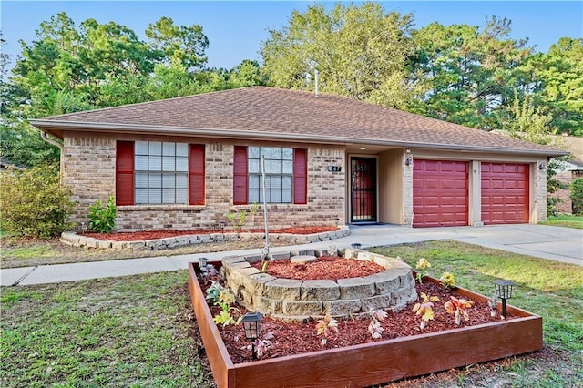 ranch-style home featuring a garage