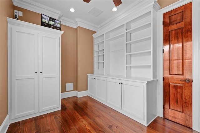 65520 S Hickory Dr, Pearl River, LA 70452 - hall with baseboards, dark wood-type flooring, crown molding, and recessed lighting