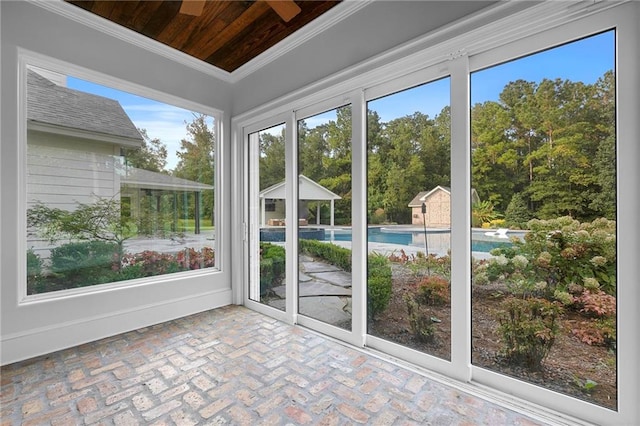 unfurnished sunroom with wood ceiling