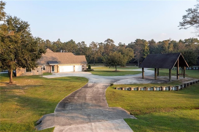 65520 S Hickory Dr, Pearl River, LA 70452 - surrounding community with a yard, driveway, and a gazebo