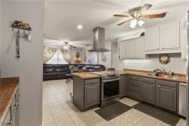 kitchen with island range hood, kitchen peninsula, gray cabinetry, stainless steel range with electric cooktop, and white cabinets