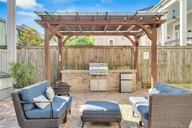 1417-1419 Esplanade Ave, New Orleans, LA 70116 - fenced backyard with an outdoor kitchen, a pergola, a patio, and an outdoor living space with a fire pit