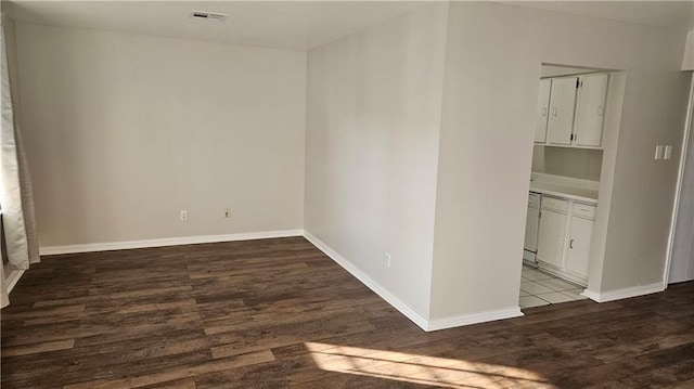 1114 N Dorgenois St, New Orleans, LA 70119 - unfurnished room featuring baseboards, wood finished floors, and visible vents