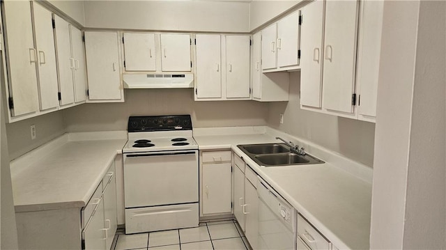 1114 N Dorgenois St, New Orleans, LA 70119 - kitchen with a sink, white appliances, light tile patterned floors, light countertops, and under cabinet range hood