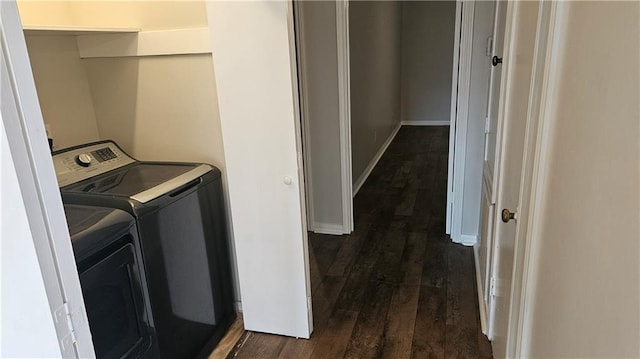 1114 N Dorgenois St, New Orleans, LA 70119 - washroom featuring dark wood-type flooring, baseboards, laundry area, and washer and clothes dryer