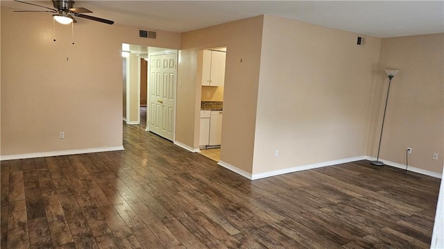 1114 N Dorgenois St, New Orleans, LA 70119 - spare room with baseboards, wood finished floors, visible vents, and ceiling fan