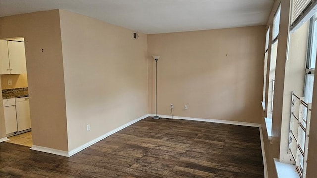 1114 N Dorgenois St, New Orleans, LA 70119 - unfurnished room with baseboards, wood finished floors, and visible vents