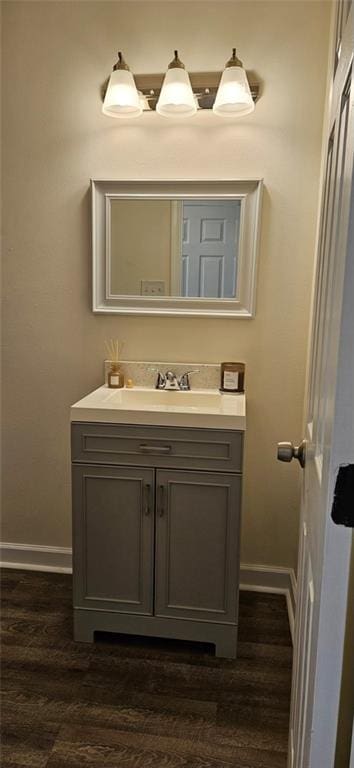 bathroom with vanity and wood-type flooring