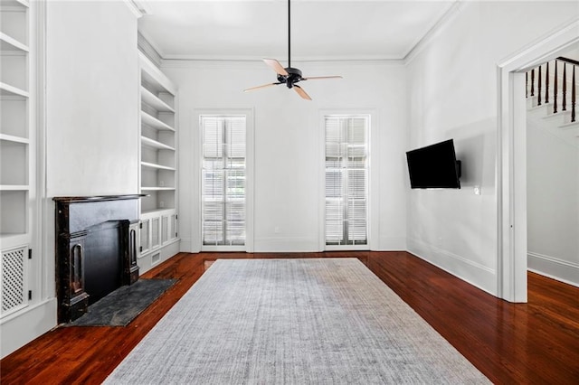 living room featuring crown molding, dark hardwood / wood-style floors, and ceiling fan