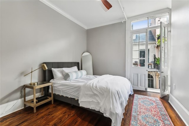 bedroom featuring ceiling fan, crown molding, and dark hardwood / wood-style floors