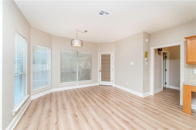 interior space with light hardwood / wood-style floors