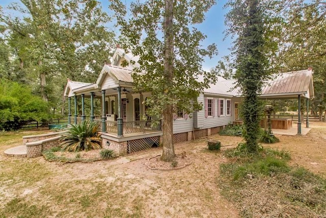 view of front facade with a wooden deck