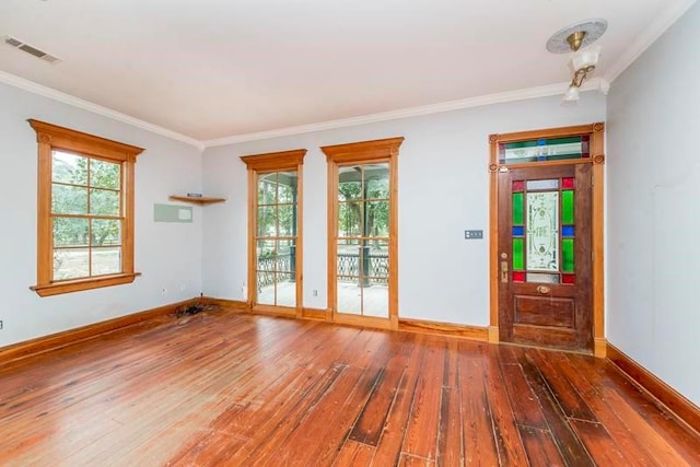 unfurnished room with dark wood-type flooring and a wealth of natural light