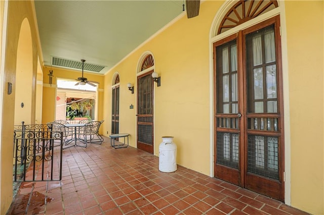 view of patio / terrace featuring ceiling fan