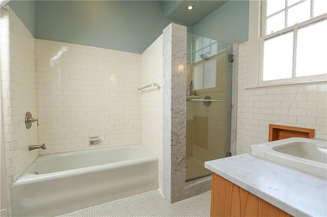 bathroom with vanity, shower with separate bathtub, and tile patterned floors