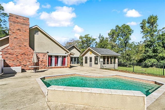 view of pool featuring a patio