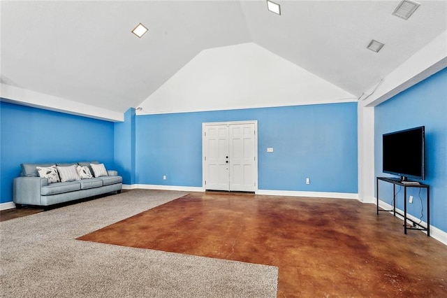 unfurnished living room featuring vaulted ceiling and concrete flooring