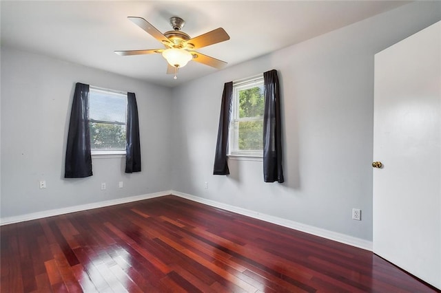 unfurnished room with hardwood / wood-style flooring and ceiling fan