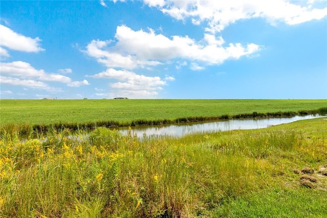 view of nature with a water view and a rural view