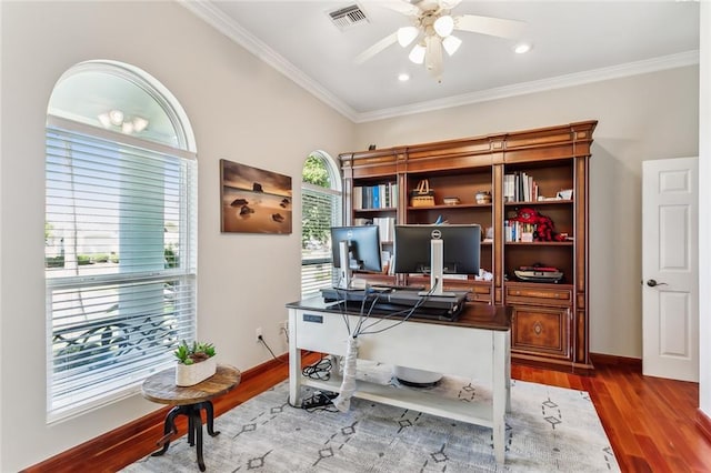 office featuring ceiling fan, ornamental molding, plenty of natural light, and hardwood / wood-style floors