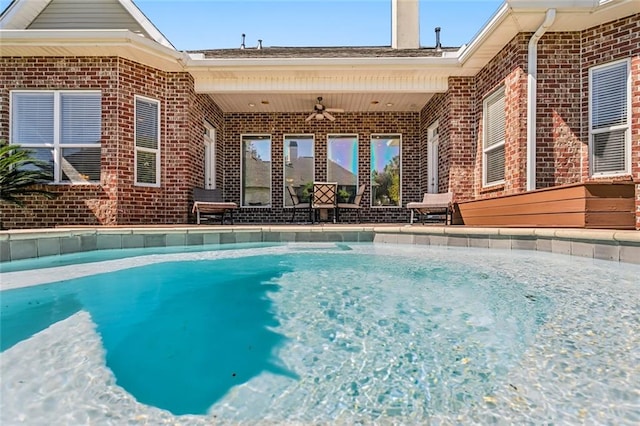 view of swimming pool with ceiling fan