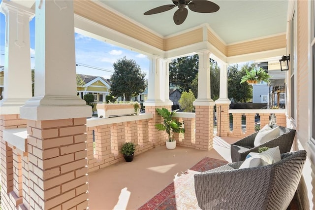 view of patio / terrace featuring exterior kitchen and ceiling fan