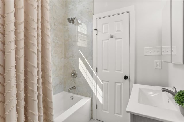 bathroom featuring vanity and shower / bath combo with shower curtain