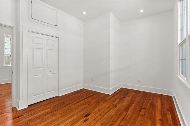 empty room featuring hardwood / wood-style flooring