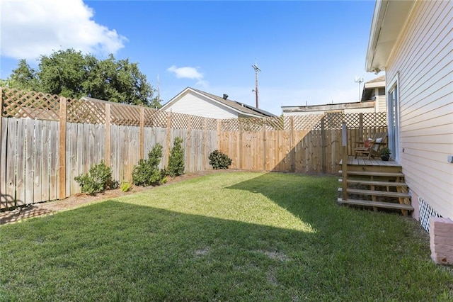 view of yard featuring a deck