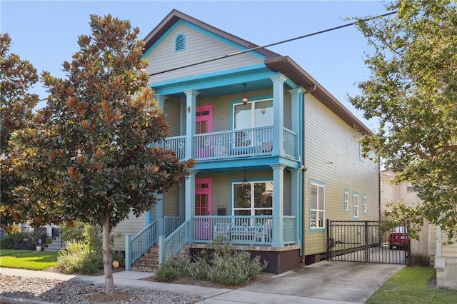 view of front of property with covered porch and a balcony