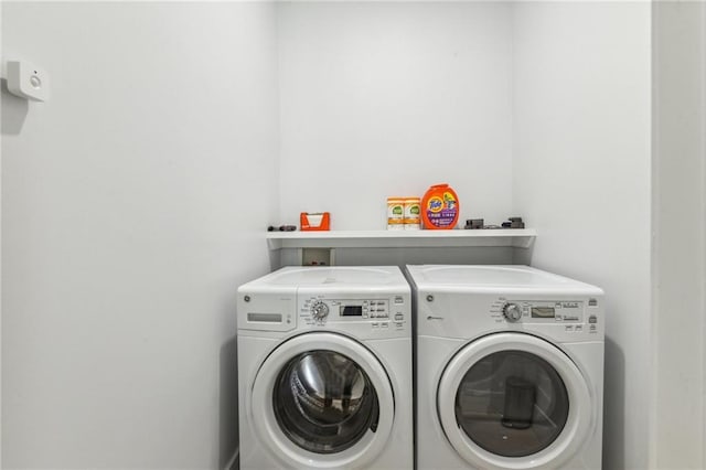 laundry area featuring washing machine and dryer