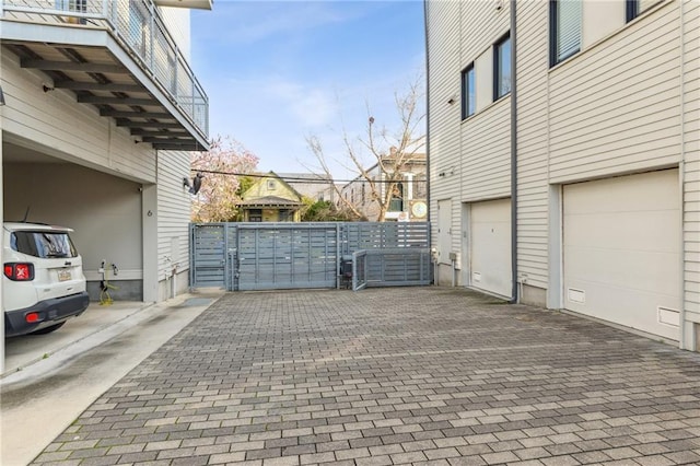 view of side of property with a garage