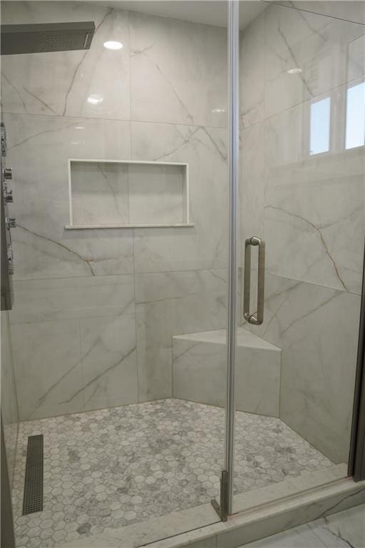 bathroom with walk in shower