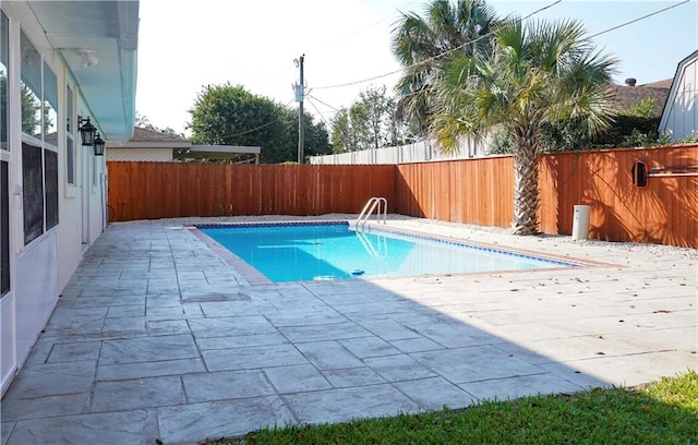 view of pool featuring a patio area