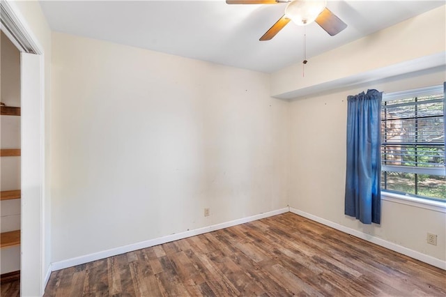 unfurnished room featuring hardwood / wood-style flooring and ceiling fan