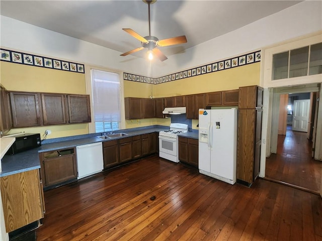 kitchen featuring sink, ceiling fan, white appliances, and dark hardwood / wood-style flooring