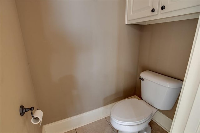 bathroom featuring tile patterned floors and toilet