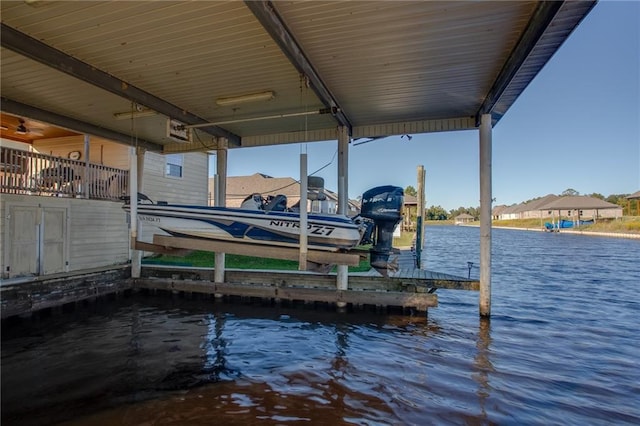 view of dock with a water view