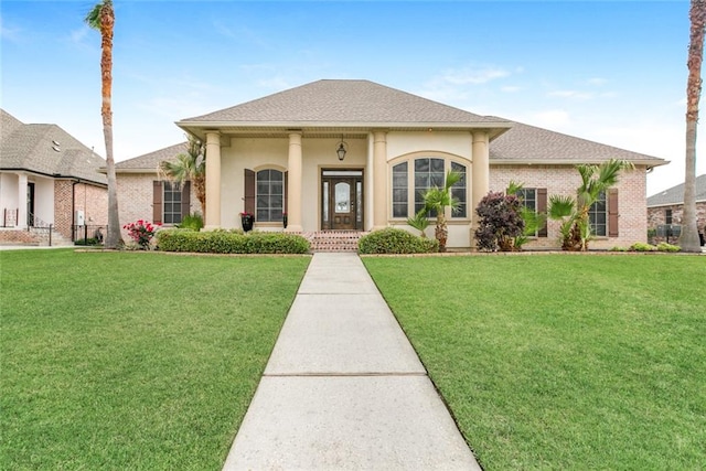 view of front of home with a front yard