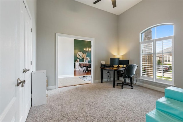 office area with ceiling fan and light colored carpet