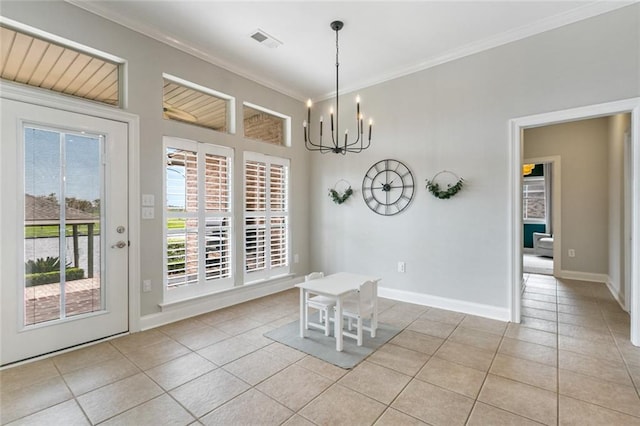 unfurnished dining area with an inviting chandelier, ornamental molding, and light tile patterned floors