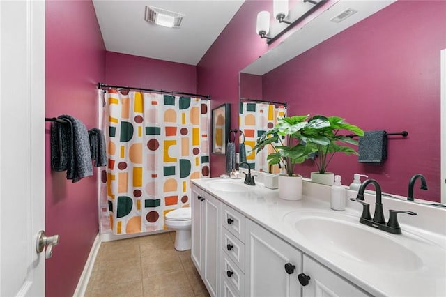 bathroom featuring vanity, curtained shower, toilet, and tile patterned floors