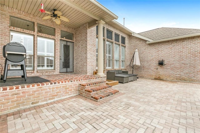 view of patio / terrace featuring ceiling fan