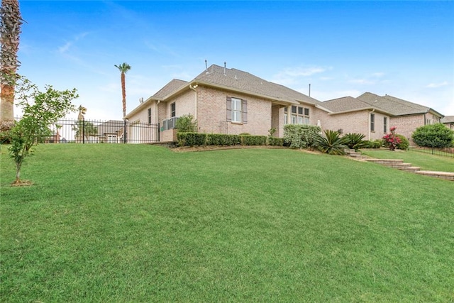 view of front of home with a front lawn