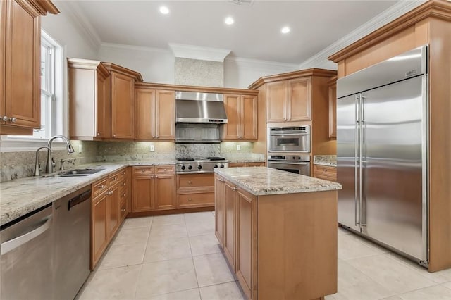 kitchen featuring extractor fan, appliances with stainless steel finishes, ornamental molding, and a kitchen island