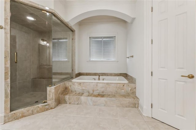 bathroom with separate shower and tub, crown molding, and tile patterned floors