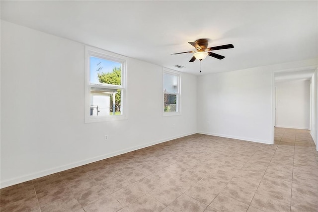 empty room featuring ceiling fan