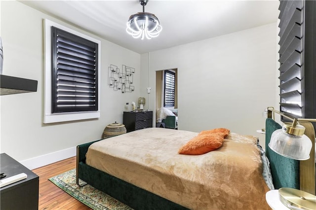 bedroom featuring hardwood / wood-style flooring